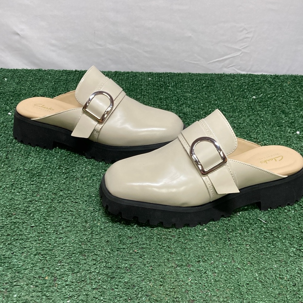 Clarks Cream Mules with Silver Buckle